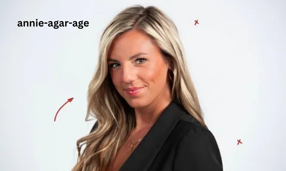 Annie Agar, a sports broadcaster and popular digital creator, smiling in a studio. She creates viral comedy skits about sports culture.